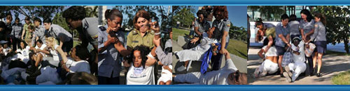 Represi�n en Cuba: La Polic�a disuelve por la fuerza una protesta de las Damas de Blanco en la Plaza de la Revoluci�n. (Vea Fotorreportaje) CUBA DEMOCRACIA Y VIDA